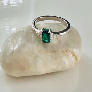 925 Sterling. Sizes 5,6,7,8 available. Emerald Cut